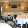 Our banquet room overlooks the 18th hole and putting green and provides seating for approximately 100 people.